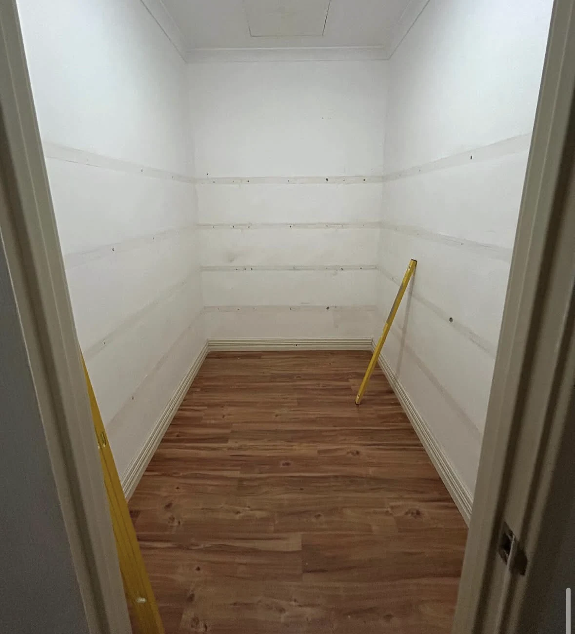 Before: the Donnybrook store room before the shelving was replaced